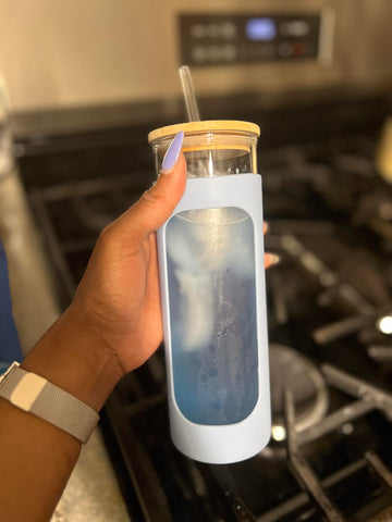 Tavo LiquidCalm liquid calm bedside glass used as part of a nightly wind-down routine.